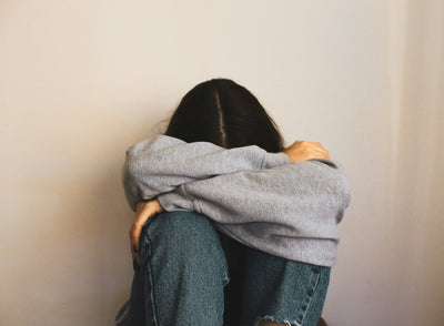 Person feeling sad and alone, reflecting the theme of Bible verses for comfort