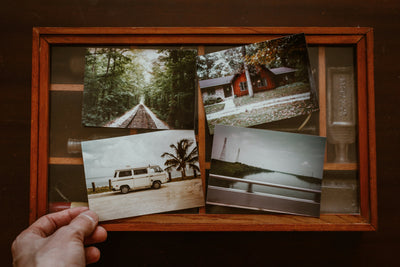 An image of lost of old photographs, illustrating remembering things