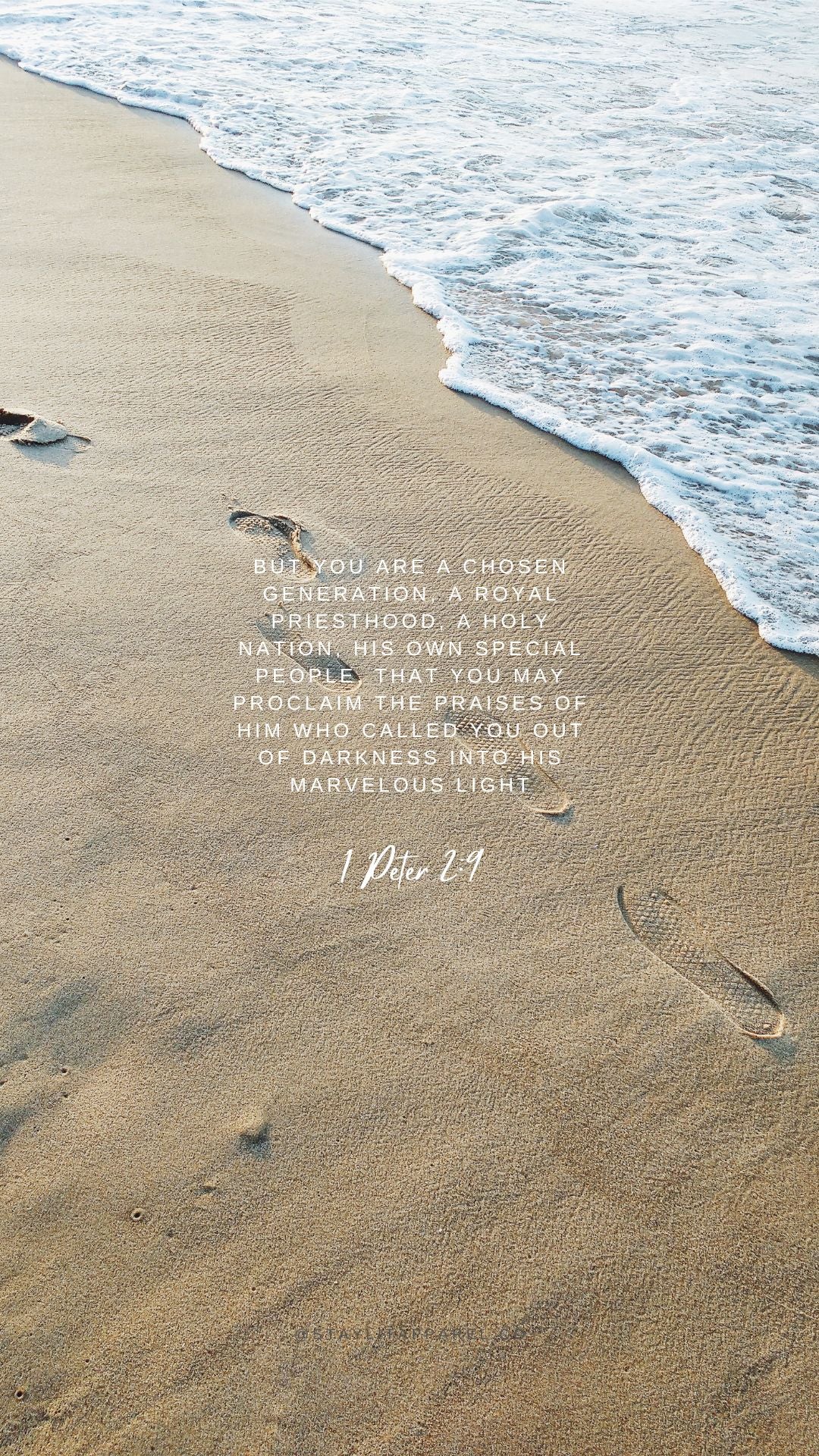 Text on sand with ocean waves