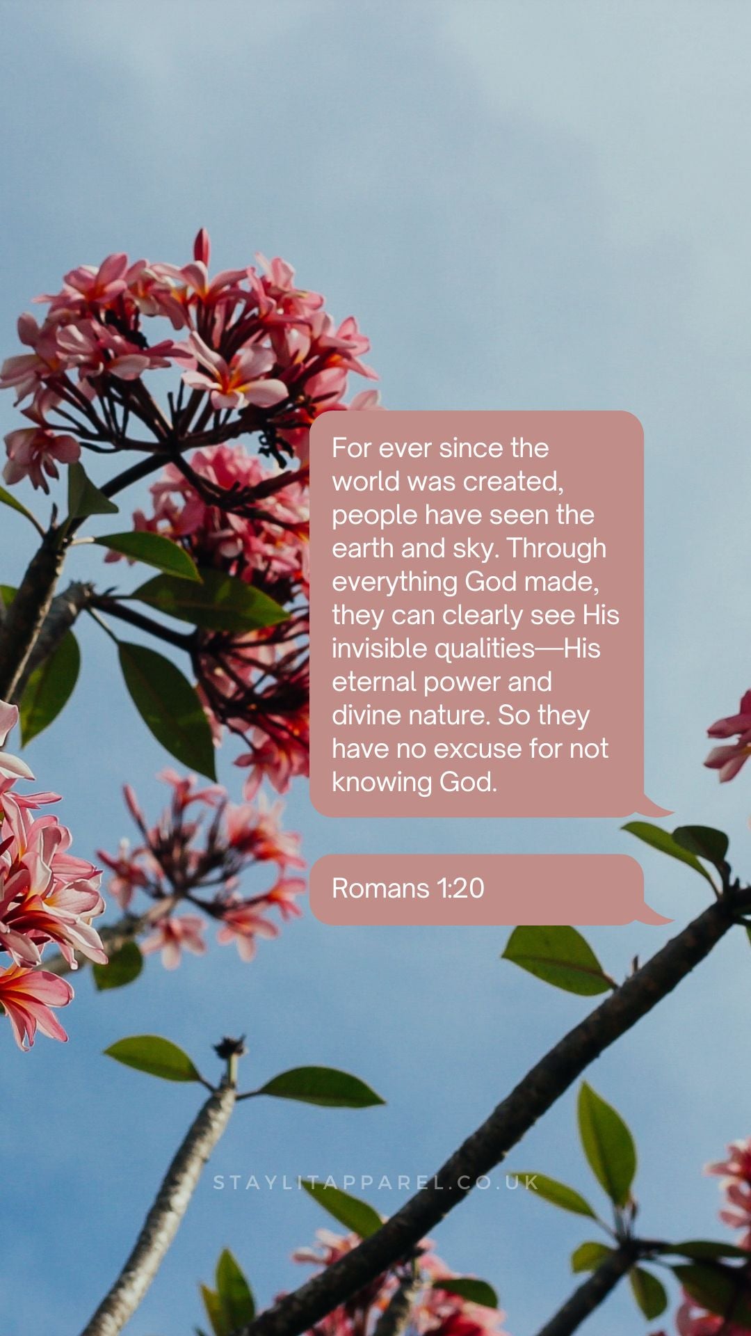 Pink flowers with a biblical quote overlay on a clear sky background