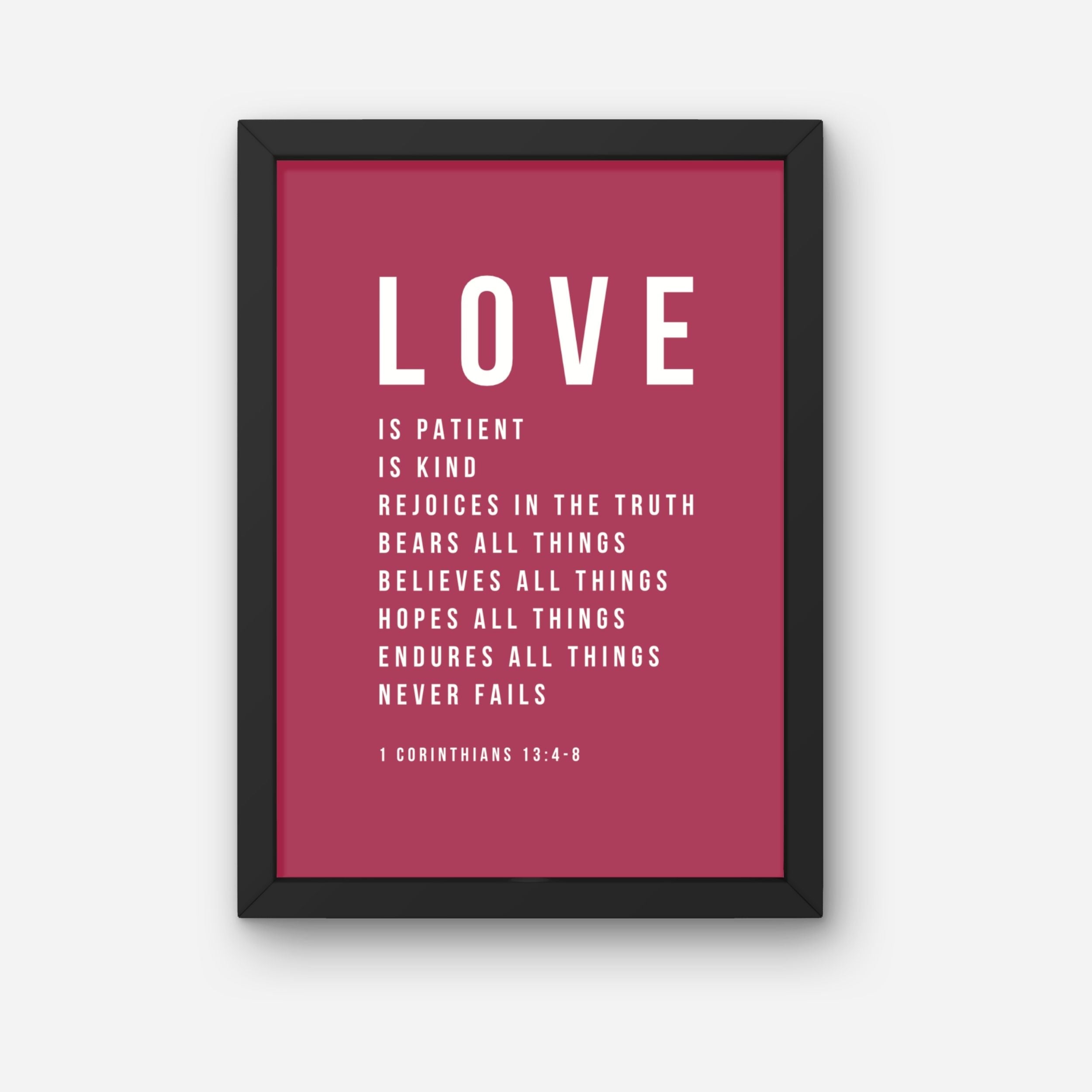 Framed poster with motivational quote on a red background. Love never fails Stay Lit Apparel Digital Art