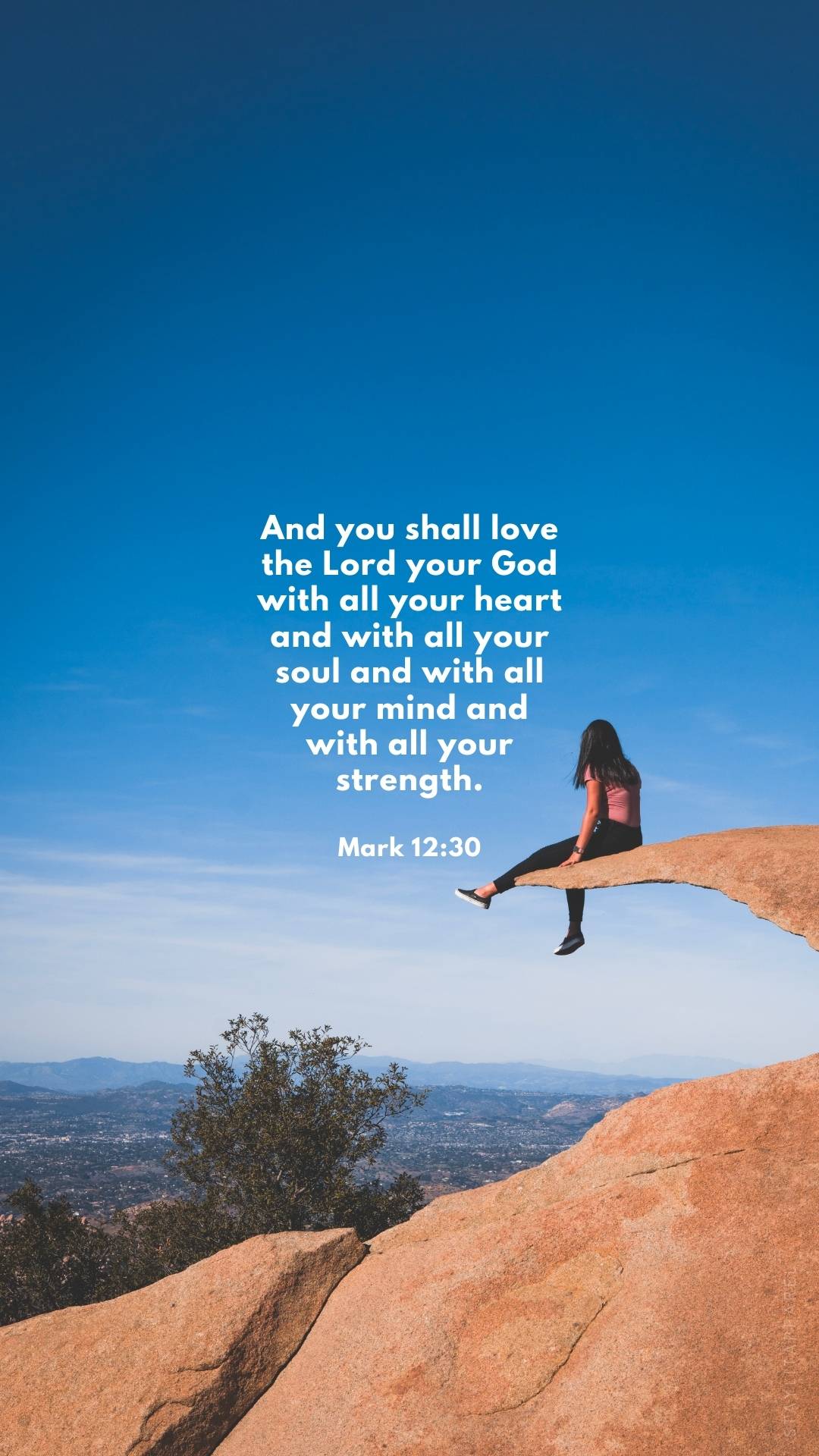 Mark 12:30 verse with woman sitting on rock arch, featured in 16 Bible Verses About God's Mighty Power | Free Download digital scripture wallpapers.