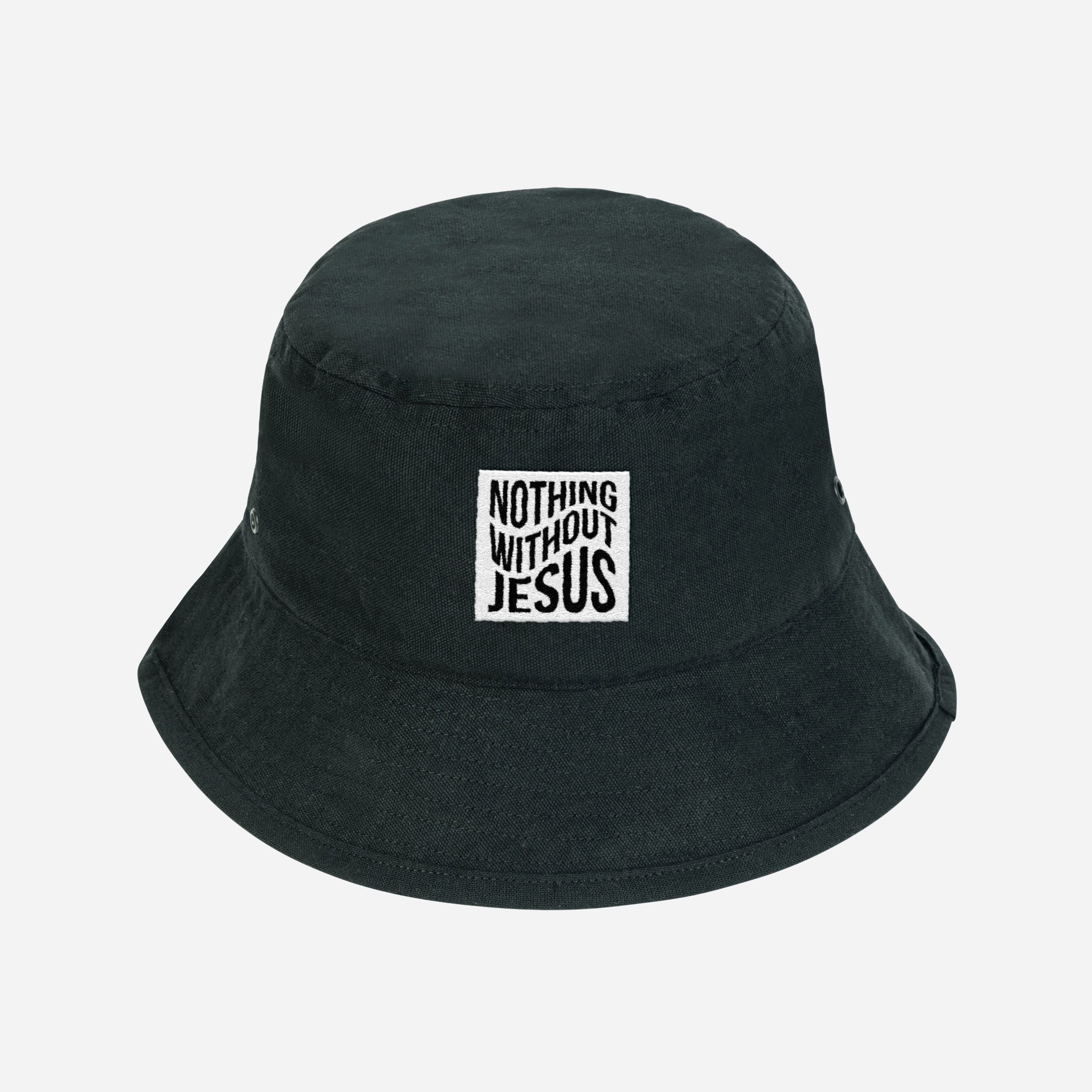 Black bucket hat with 'Nothing Without Jesus' text on a white background