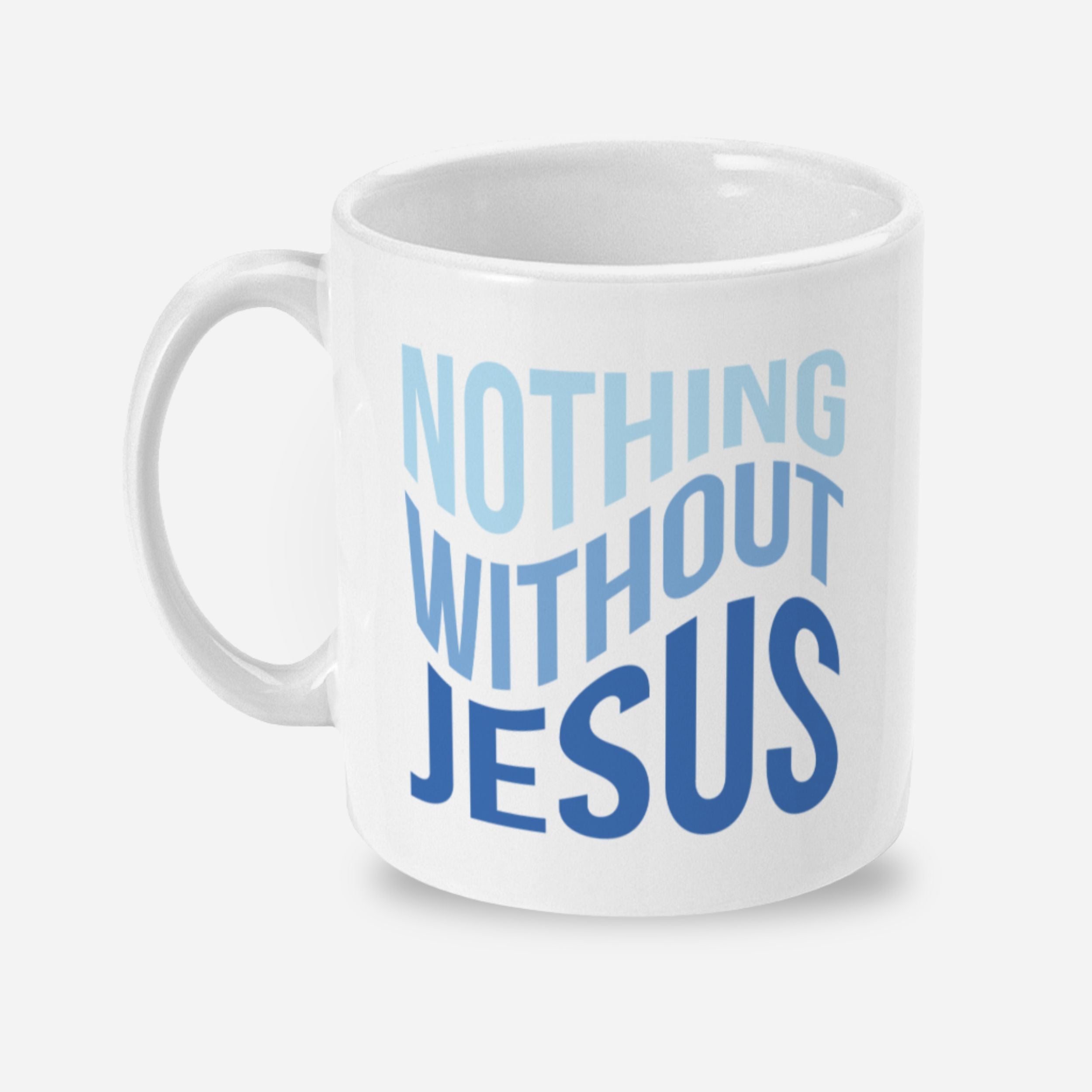 White mug with 'Nothing Without Jesus' text in blue on a white background