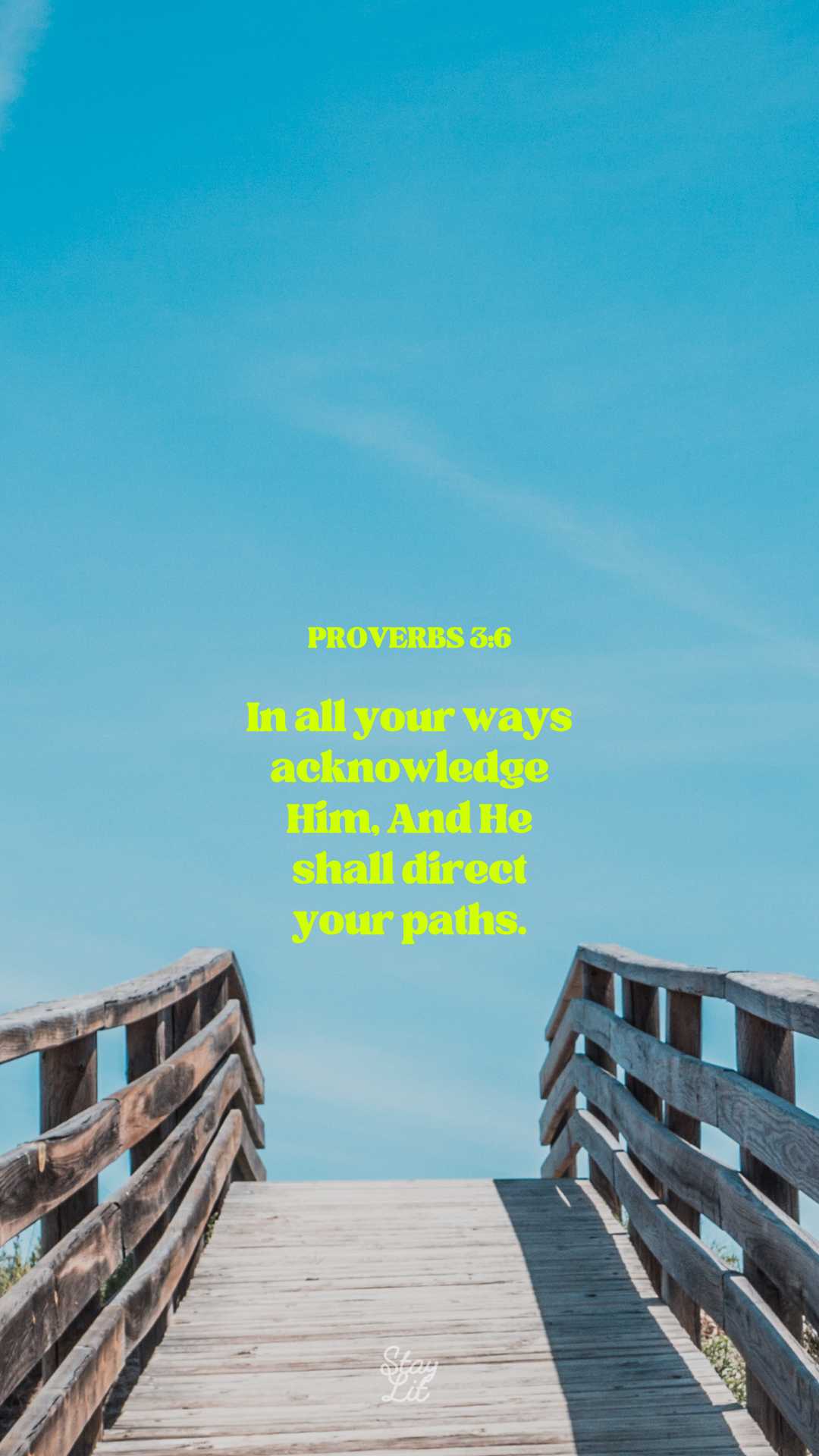 Wooden boardwalk leading to a clear blue sky with a motivational quote.