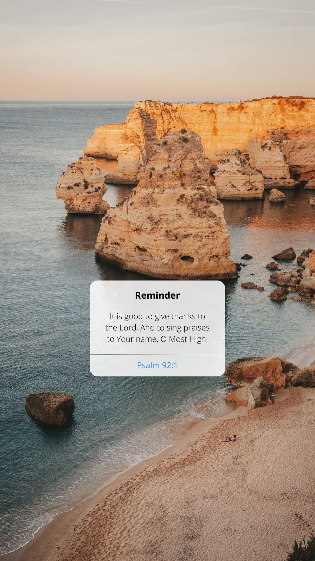 Beach scene with cliffs and ocean, featuring a Bible verse reminder.