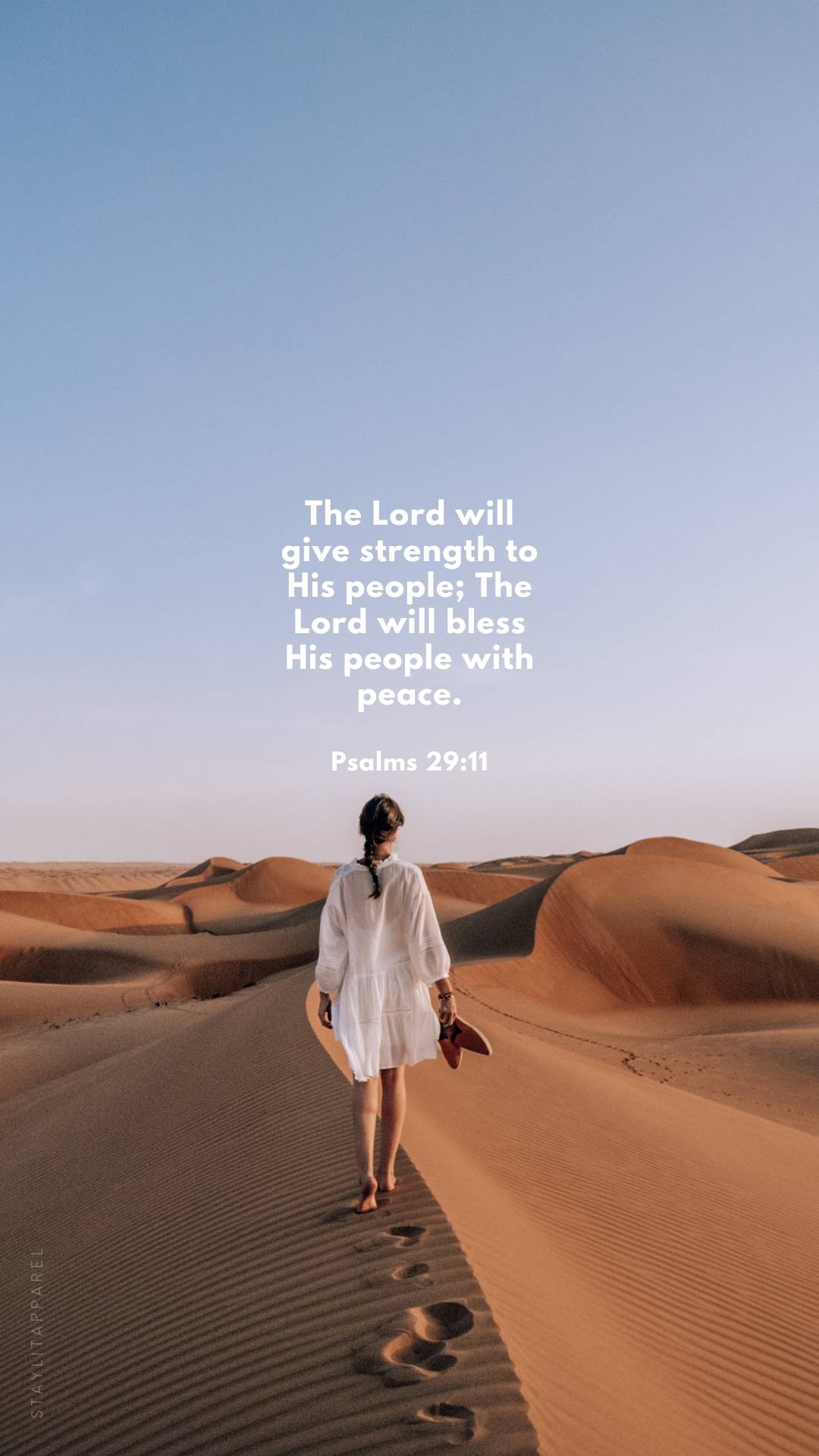 Psalms 29:11 verse with woman walking in desert, included in 16 Bible Verses About God's Mighty Power | Free Download digital scripture wallpapers.
