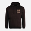 A dark brown pullover hoodie with 'SAVED BY GRACE' printed in a light beige font on the left chest, displayed on a clean light gray background.