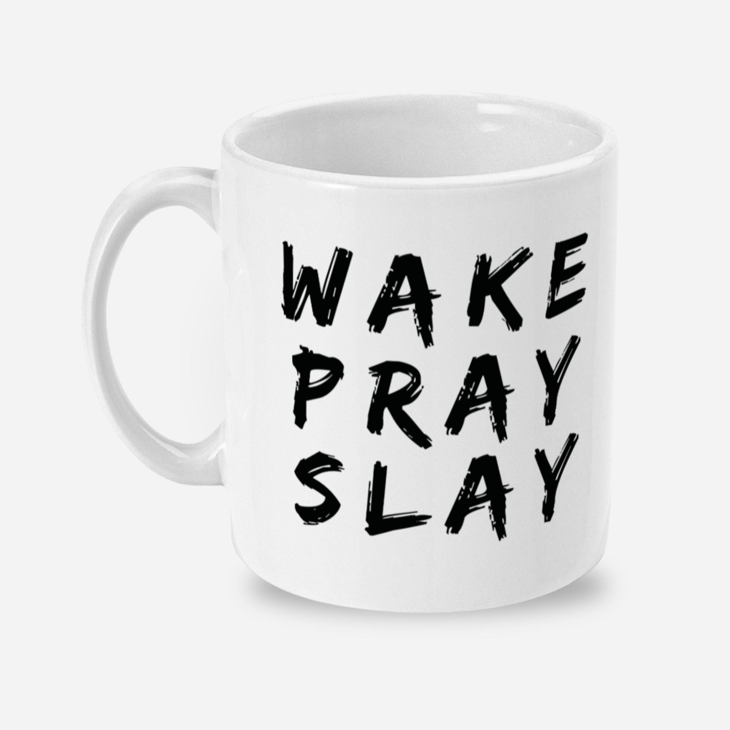 White mug with 'Wake Pray Slay' text on a white background